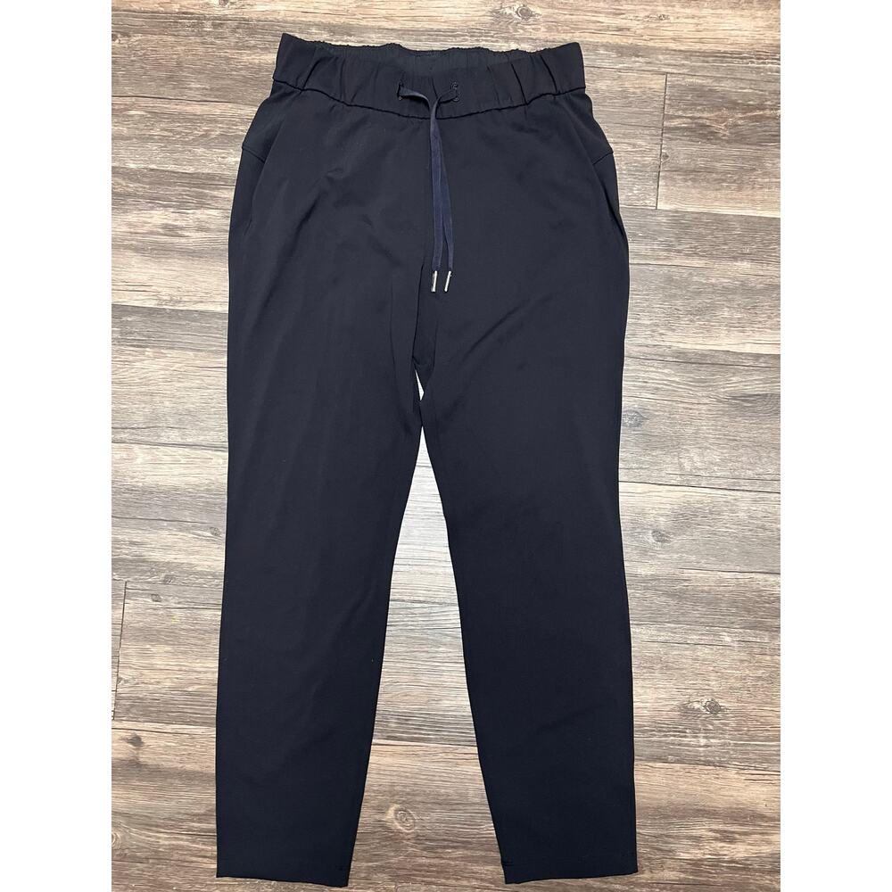 Lululemon On The Fly Pant Luxtreme Black 7/8 Sz 4 Jogger Athleisure Lounge Comfy - Picture 2 of 10